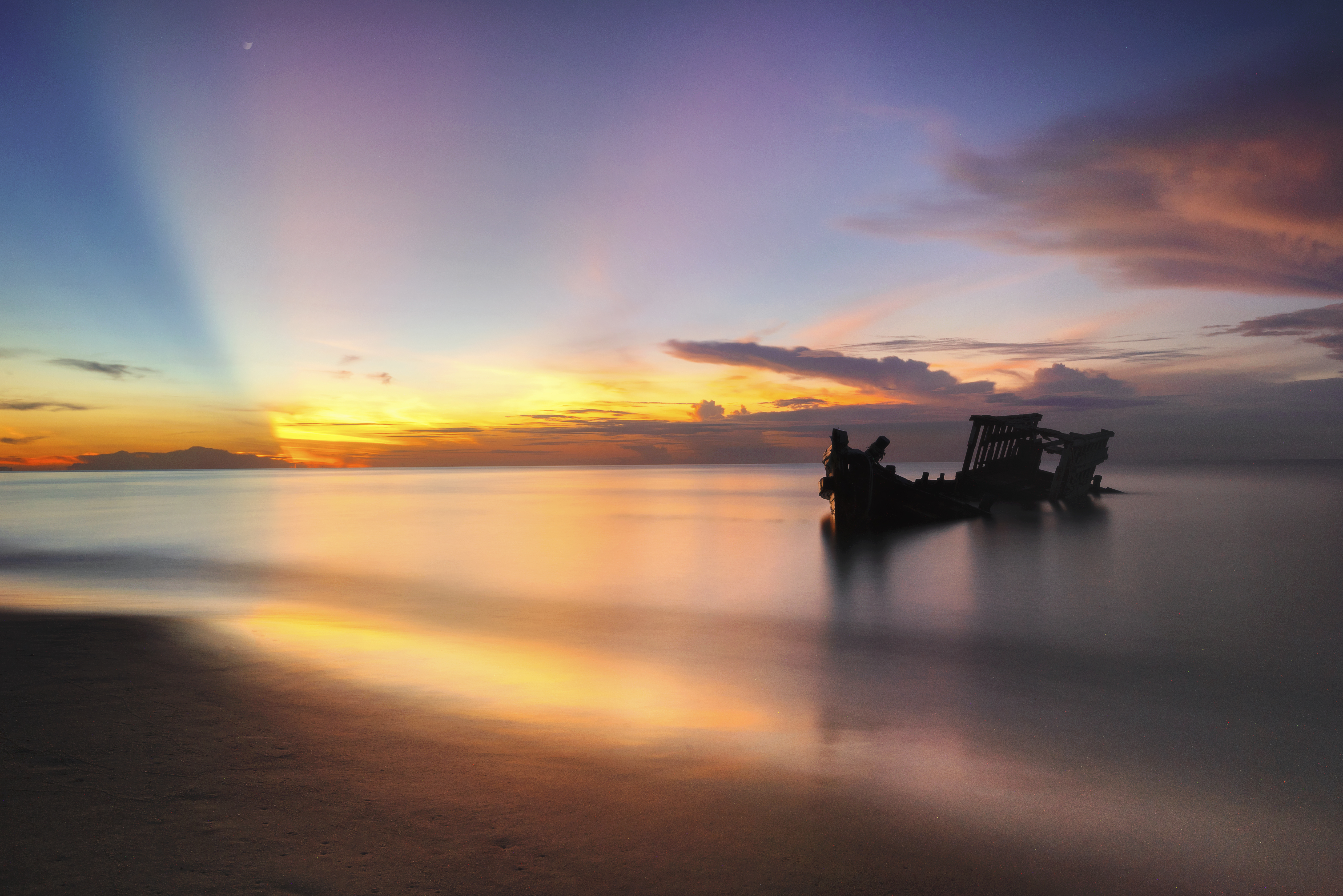 ship-wreck-fishing-boat-onthe-beach-sunrise.jpg